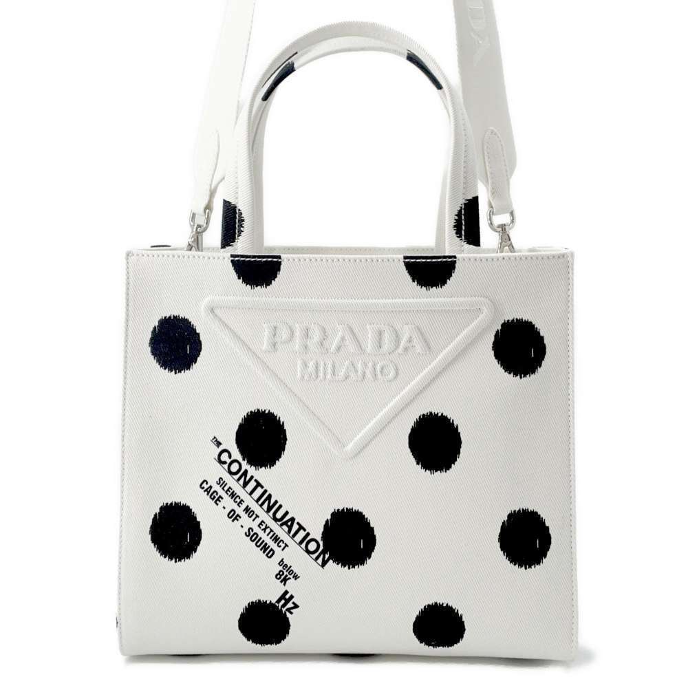 Prada handbag triangle logo polka dot canvas shoulder bag black white